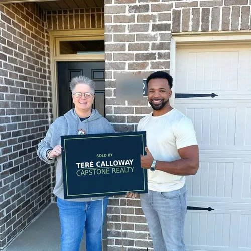 Teré Calloway with clients on closing day