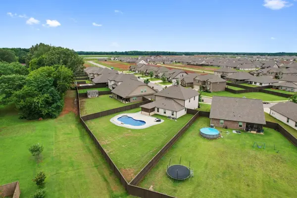 Corner lot, extra-deep back yard, nothing behind you