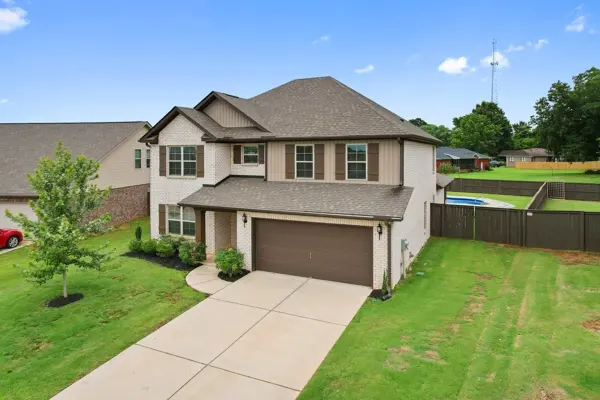 Mature landscaping and irrigated lawn