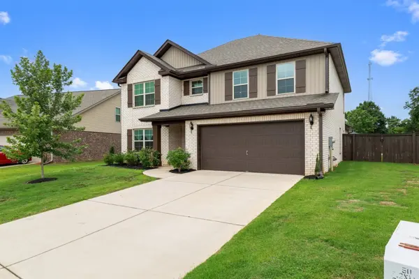Two-car garage and extended concrete drive