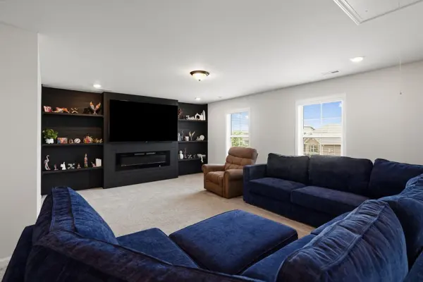Upstairs bonus room, 22×20, with built-in shiplap media wall